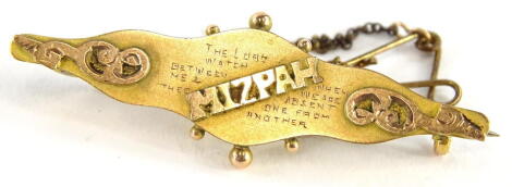 A 9ct gold Victorian Mizpah brooch, with engraving and central Mizpah wording, yellow metal, marked to back 9ct, with single pin back and safety chain, 4.5cm W, 3g all in.