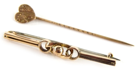 A 9ct gold bar brooch and stick pin, comprising a gold lapel pin with heart shaped top, and a central twist design bar brooch, 4.1g all in.