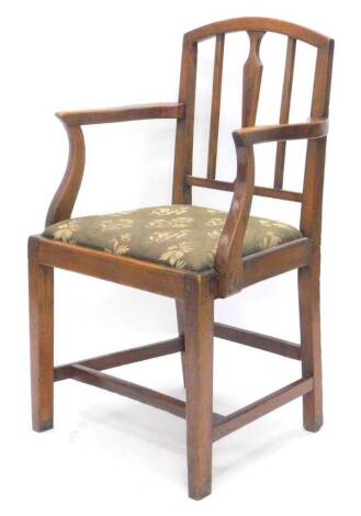 An early 19thC elm open armchair, with a rail back, drop in seat on square tapering legs, with H stretcher.