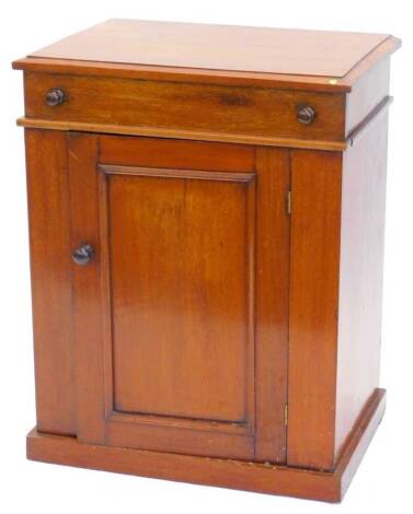 A 19thC mahogany enclosed wash stand, the rectangular hinged lid enclosing a recess for a bowl and beaker, above a panelled door, on a plinth base, 61cm W.