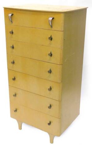 A Retro beige painted oak tall chest of drawers, on turned tapering feet, with gilt metal handles, 129cm H, 64cm W.