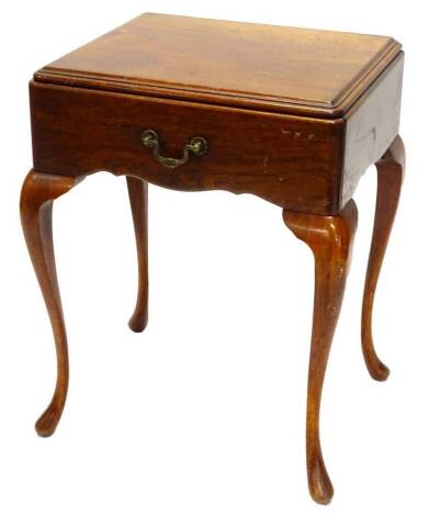 A mahogany small side table, the top with a moulded edge above a frieze drawer, on cabriole legs, with pad feet, the top 50cm W.