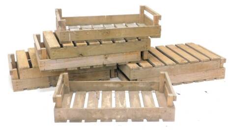 Eight industrial style apple boxes, of slatted form, approx 76cm W.