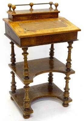 An Edwardian mahogany and tulipwood banded demi lune table, the top with a  moulded edge, above