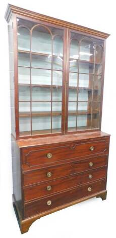 An early 19thC mahogany secretaire bookcase, the top with a moulded cornice above two astragal glaze doors and enclosing adjustable shelves, the base with a fall front drawer enclosing a fitted interior with later leatherette inset, above a further three 