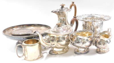 Miscellaneous items of silver plate, to include a pierced wine bottle cooler, four piece tea set, silver mounted brush, etc.