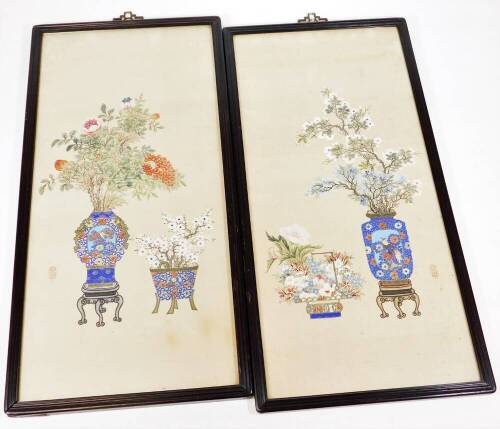 Withdrawn pre-sale by vendor. A pair of hardwood framed Chinese watercolours, of vases containing blossoming flowers and branches,19th/20th century, 67cm x 32cm. (2)