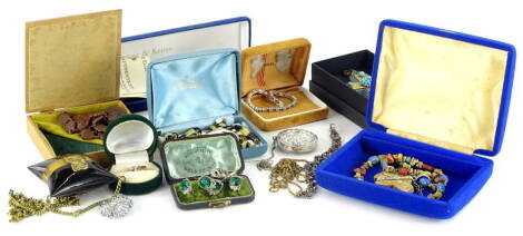 Various costume jewellery and effects, to include a crucifix pendant, with gilt metal design set with turquoise, a JPK ladies wristwatch, silver plated bracelets, modern necklaces, bracelets, etc. (1 tray)