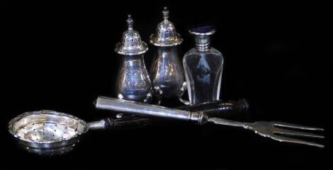 A George V cut glass enamel and silver perfume bottle, of shouldered form, Birmingham 1926, 7cm H, various other silver and effects, a salt and pepper pot, sifter and fork, 2oz of silver. (a quantity)