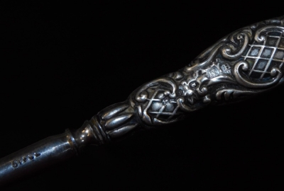 A small Victorian silver skewer, 15cm L, London 1863, 0.50oz, two continental preserve spoons, button hook, etc. - 2