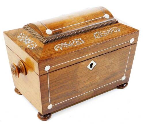 A 19thC rosewood and mother of pearl inlaid tea caddy, of sarcophagus form, with turned handles on compressed bun feet with fitted interior, 15cm H, 22cm W, 14cm D.