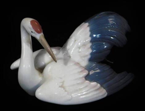 A Lladro figure of a Stork, no. 1599, printed and impressed marks beneath, 11cm W.