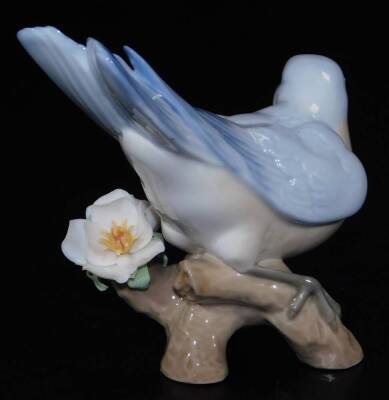 A Lladro figure group of a bird, on flowering tree branch, printed marks beneath, 10cm H. - 2