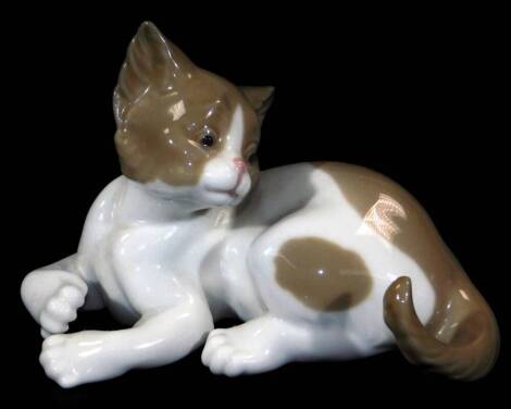 A Lladro figure of a recumbent kitten, no. 55114, printed and impressed marks beneath, 14cm W.