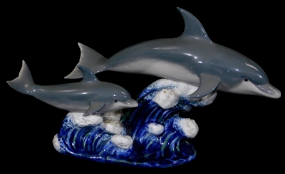 A Lladro large dolphin group, no. 6470, printed and impressed marks beneath, 16cm H.