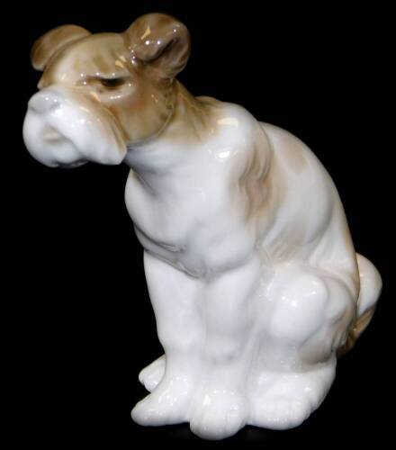 A Lladro figure of a puppy, printed marks beneath, 8cm H.