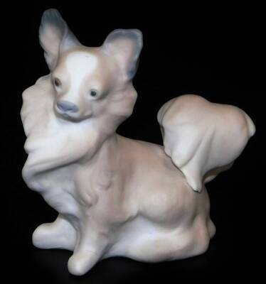 A Lladro figure of a chihuahua, matt finish, printed marks beneath, 7cm H.