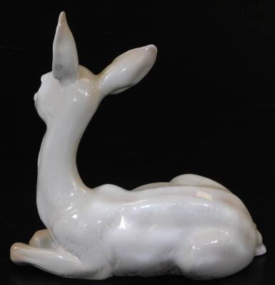 A Lladro figure of a recumbent fawn, no. E30 O33, printed and impressed marks beneath, 16cm H. - 2