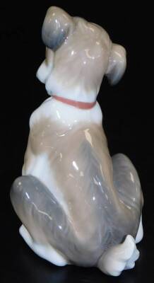 A Lladro figure of a puppy, with snail to the leg, printed marks beneath, 13cm H. - 2