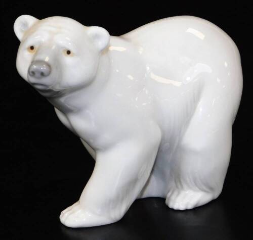 A Lladro figure of a polar bear, no. 21E, printed and impressed marks beneath, 10cm H.