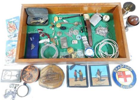 A cabinet of curiosity, bygones, collectables, to include wristwatches, cup, treen, buttons, the cabinet 40cm W. (a quantity)