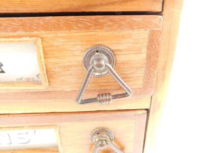 A late 19thC Morris and Yeoman's oak haberdashery chest, of three drawers, named to each drawer, respectively 'Morris and Yeoman's Needles and c', raised on a plinth base, 27cm H, 38.5cm W, 28.5cm D. - 2