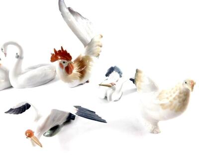 Lladro porcelain figures of birds, including three storks, cockerel and hen, a pair of swans, their necks entwined as a heart, geese, etc., together with a porcelain butterfly. (10) - 2