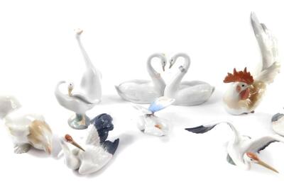 Lladro porcelain figures of birds, including three storks, cockerel and hen, a pair of swans, their necks entwined as a heart, geese, etc., together with a porcelain butterfly. (10) - 3