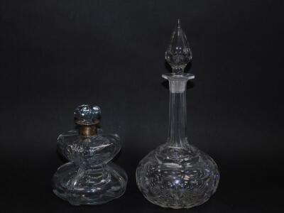 A late 19thC cut glass decanter and stopper, of compressed hour glass form, with silver collar, Thomas Whitehouse, London 1896, 18cm H, together with a cut glass globe and shaft decanter, 33.5cm H. (2) - 2