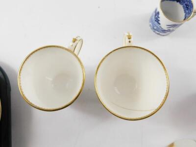 A late 19thC Mintons porcelain part coffee service, of fluted form, with turquoise and gilded decoration, comprising eight cups and seven saucers, together with six Royal Worcester and Davenport blue and white chinoiserie demi-tasse coffee cans. (qty) - 9