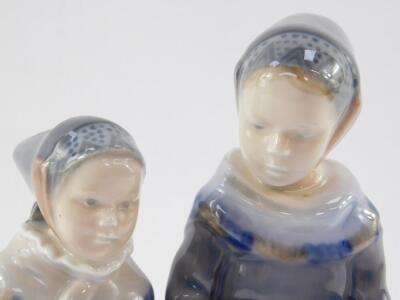 A Royal Copenhagen porcelain figure group of a pair of girls, holding hands, No 1316, printed and painted marks. - 2