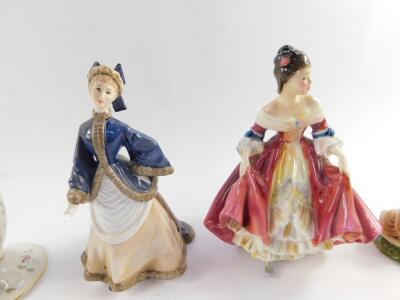 A Lomonosov porcelain figure of a seal, Royal Doulton figure Southern Belle, HN2229, Royal Worcester figure Winter's Morn, Coalport figure Jacqueline, German porcelain vase decorated with floral sprays, and a Beswick Beatrix Potter figure modelled as Ben - 2