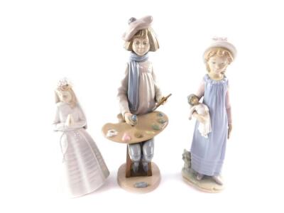 A Lladro porcelain figure of a girl, modelled standing holding a rag doll, 28cm H, together with a Nao porcelain figure of a boy artist, modelled seated with a pallet and tube of paint and paint brush, 22cm H, and a Nao figure of a bride, 24cm H. (3)