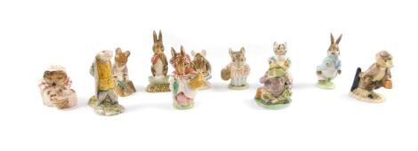 A group of Beatrix Potter figures, brown back stamp, comprising Fierce Bad Rabbit, Mrs Tittlemouse, Appley-Dapply, Hunca Munca Sweeping, Mr Jeremy Fisher, Tabitha Twitchett, Mrs Rabbit, Sir Isaac Newton, and Peter Rabbit., together with a later Beswick fi