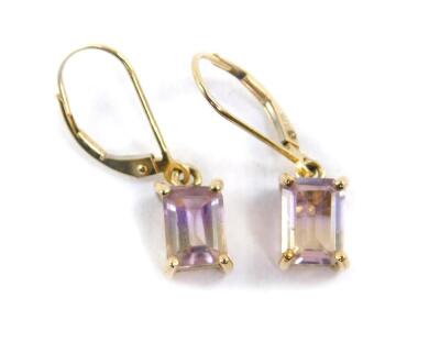 A pair of 9ct gold and ametrine single stone earrings, rectangular cut in a claw setting with loop attachments, with certificate, 2.18g.