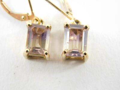 A pair of 9ct gold and ametrine single stone earrings, rectangular cut in a claw setting with loop attachments, with certificate, 2.18g. - 2