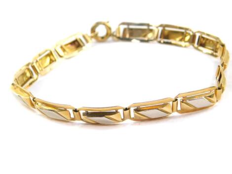 A bicolour rectangular link bracelet, on a bolt ring clasp, stamped 18ct, 6.2g.