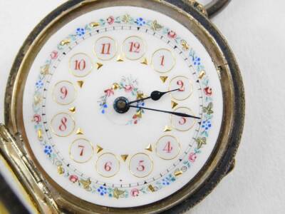 A Victorian lady's silver cased pocket watch, open faced, keyless wind, white enamel dial, with floral decoration, Arabic numerals, jewelled movement, the case with repeating engraved geometric decoration, shield reserve in a floral and ivy leaf surround, - 2