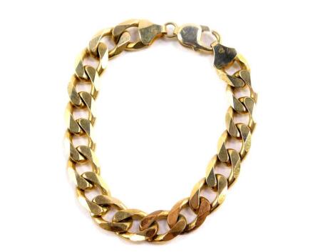 A 9ct gold curb link bracelet, on a lobster claw clasp, 30.9g.