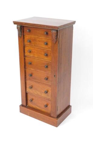 A Victorian mahogany Wellington chest, with seven graduated drawers, raised on a plinth base, 105cm H, 50.5cm W, 34.5cm D.