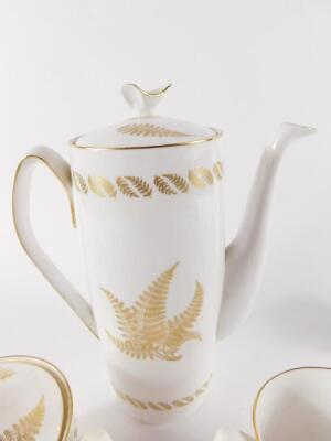 A Spode porcelain part coffee service, decorated in the Golden Fern pattern, comprising coffee pot, sucrier, cream jug, six cups and saucers. - 4