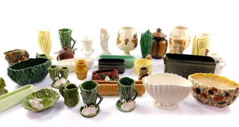 A group of Sylvac pottery, including planters, vases and dishes surmounted with elves, swans, etc., leaf moulded vase, shell moulded vase, pebble moulded bowl, etc. (qty)