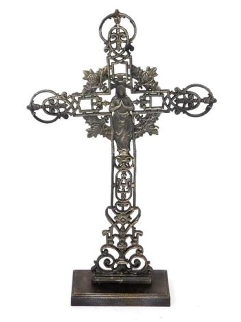 A French cast iron altar cross, cast with the Virgin Mary, roses and foliate scrolls, raised on a rectangular base, 89cm H, 51.5cm W.