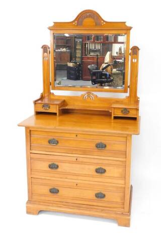 A Victorian satin walnut dressing chest, the swing frame mirror with floral carved crest rail, inset rectangular bevelled glass, frame with two small drawers, united by a shelf, over three drawers raised on bracket feet, 179cm H, 99.5cm W, 51cm D.