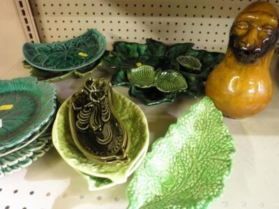 A quantity of green leaf moulded plates