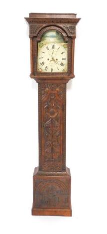 A Georgian oak long case clock, by I Hocking of Redruth, the break front arch dial decorated with a landscape with swans, one with moving head, dial bearing Roman numerals, subsidiary seconds dial and date aperture, two train eight day movement with bell 