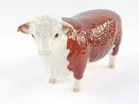 A Beswick figure of a Hereford Bull, Champion of Champions, printed marks.