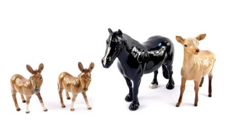 A Beswick black gloss figure of a Dale horse, Beswick standing roe deer, and two asses. (AF). (4)