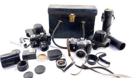 A Zenit-E camera, No 77284253, Zenit-B camera, Prinzgalaxy zoom lens, 1:4.5F=200mm, No 67495, and sundry camera accessories, cased. (qty)