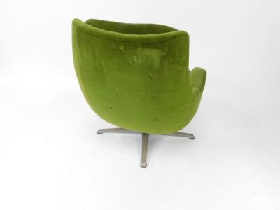 A 1960s/1970's swivel egg chair, probably Parker Knoll, upholstered in green buttoned back fabric, with loose cushions to seat, raised on a metal X frame base, together with a G-Plan teak stool, with circular tapestry seat, Danish design by Ib Kofod-Larse - 4